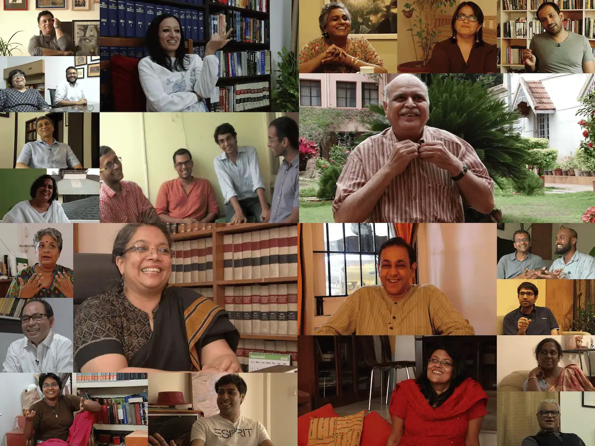A grid of video stills of people interviewed for the archive, smiling and speaking to camera.